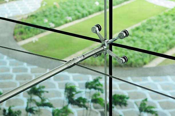Spider fittings for frameless glass facades and walls.